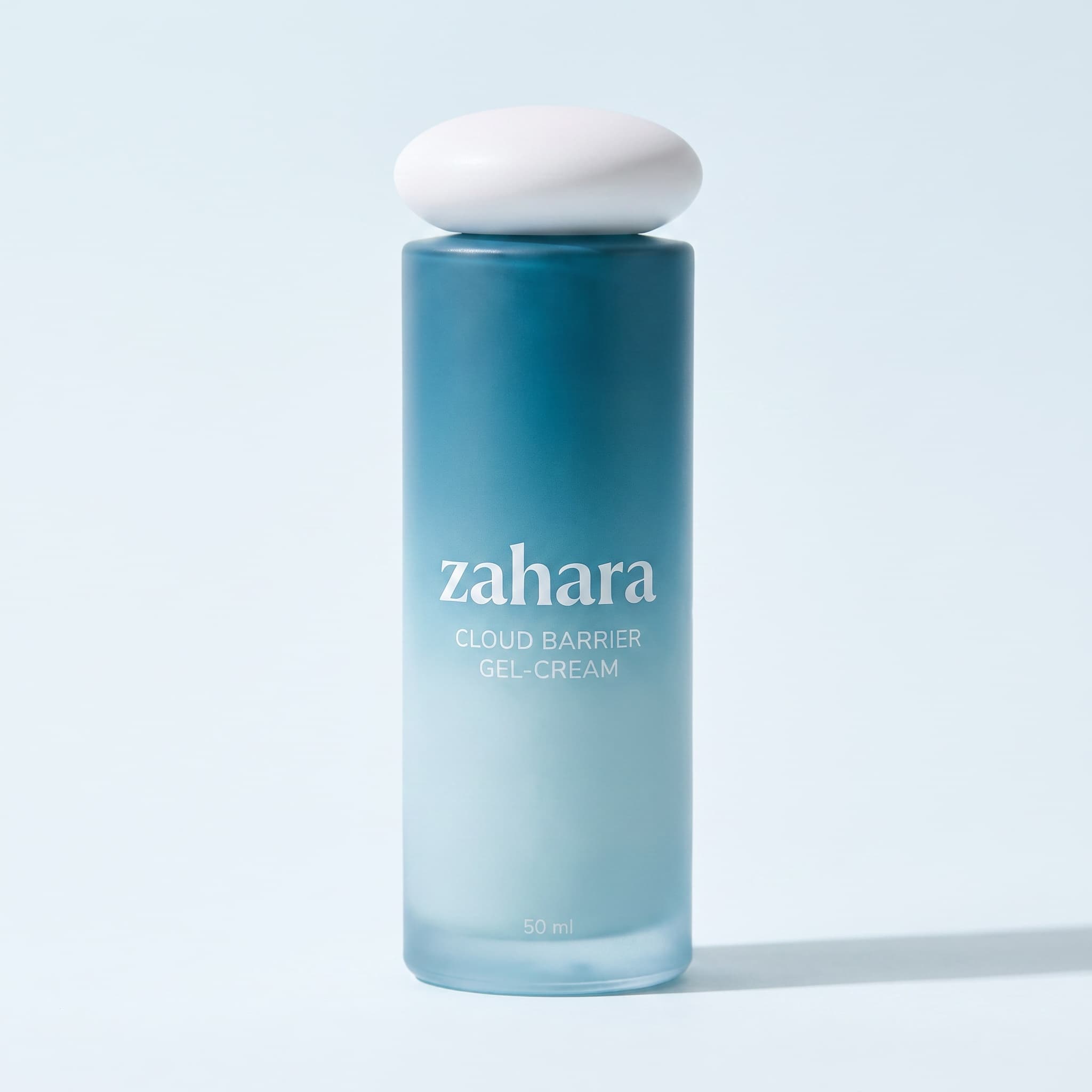 Zahara Cloud Barrier Gel-Cream aqua-to-lagoon gradient bottle with white pebble cap.